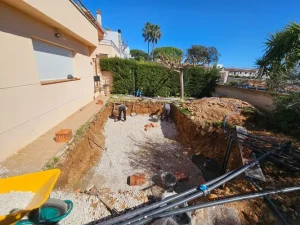 Excavación de piscina y relleno con machaca para base estructural